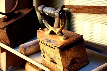 Antique cast iron coal iron with wooden handle