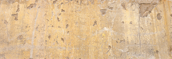 Decorative vintage factory cement wall paint Texture of Old white and yellow messy wall stucco grunge background