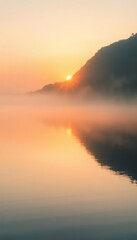 Peaceful sunrise over a misty lake with a silhouetted mountain. Golden light reflects on the calm water. Serene, tranquil, and nature-inspired. Ideal for backgrounds and travel themes.
