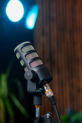 Engaging podcast setup featuring a microphone ready for broadcast interview in a cozy studio...
