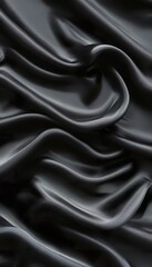 Fototapeta premium black silk satin background. Soft wavy folds on the fabric.