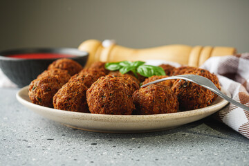 delicious traditional Italian meatballs polpette on a stone rustic background