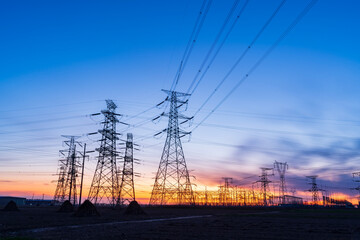 The pylons are in the evening, Substation in the evening, High voltage substation and beautiful sunset glow