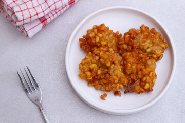 Delicious Crispy Corn Fritters on a Plate