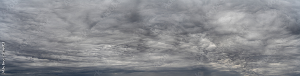 Wall mural panorama of dramatic gray summer storm clouds with interesting patterns and shape