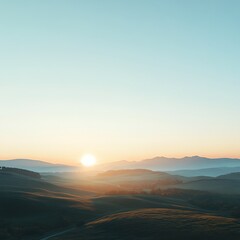 Obraz premium Rolling Hills and Countryside Illuminated by Sunrise Glow