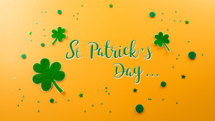 Happy St Patrick's Day decoration concept made from shamrocks ( clover leaf) on yellow background.