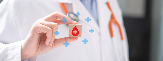 Blood donation on wooden block doctor health care physician disease concept