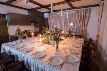 Decorative elements for festive events, home decorations. Festive table decorations, flowers and tableware