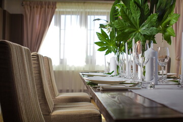 Festive table decorations, flowers and tableware, beautiful table setting for guests
