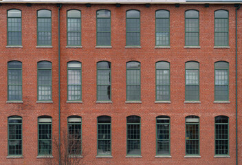 Fototapeta premium facade view of brick wall and window of old factory building