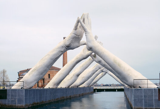 Venice, Italy - March 26, 2024: Building Bridges, monumental installation of contemporary Italian artist Lorenzo Quinn.