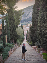 Man walking down the stairs of the Calvary of Pollenca in Mallorca