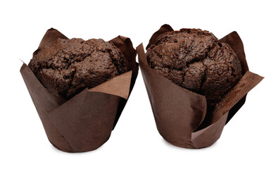 Two chocolate muffins in brown paper cup isolated on white background.