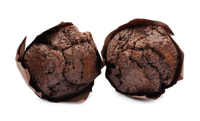 Two chocolate muffins in brown paper cup isolated on white background.