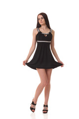 Young woman in black little dress