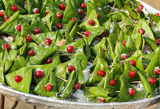 Closeup of Indian Sweet paan, meetha pan, Betel leaves mouth Freshener, Traditional indian dessert Paan made with Betel leaf and other ingredients is eaten as a dessert, also aids as a mouth freshener