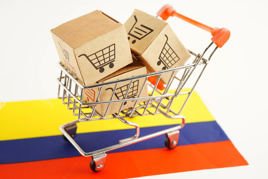 Online shopping, Shopping cart box on Colombia flag, import export, finance commerce. - Powered by Adobe