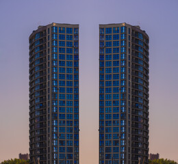 Fototapeta premium Cityscape on a summer day, modern buildings and houses 