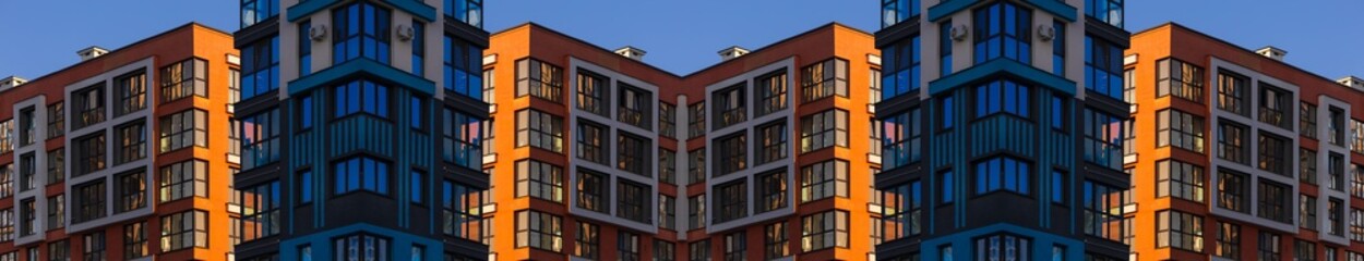 Cityscape on a summer day, modern buildings and houses 