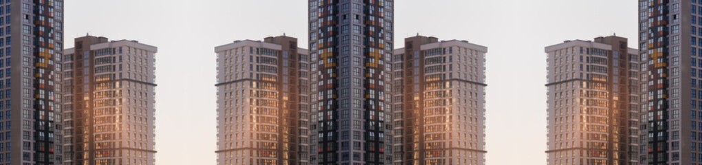 Modern buildings, walls and windows, reflections and sun rays. City view on a sunny day. 