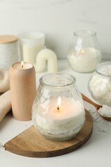 Burning soy wax candles on light table