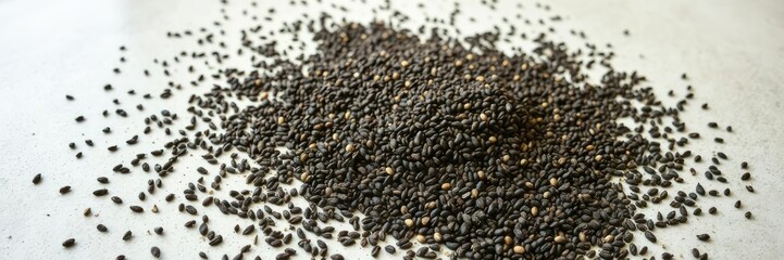 High-resolution image of a black pepper seed mixture creating an intricate design on the floor, floor decoration, artisanal pattern