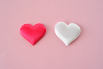 Obraz premium Red and White Hearts on pink top view