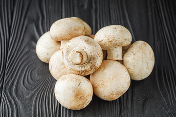 Fresh Champignons A Tasty and Healthy Ingredient on a Black Background