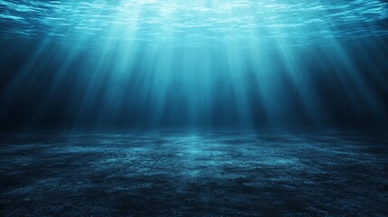 Fototapeta premium Mysterious underwater light rays in blue waters.