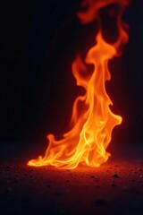 Flame abstract on a black surface with an eerie glow, burning, intense, heat