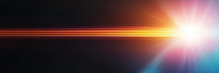 Obraz premium A bright light is shining on a dark background. The light is orange and the background is black