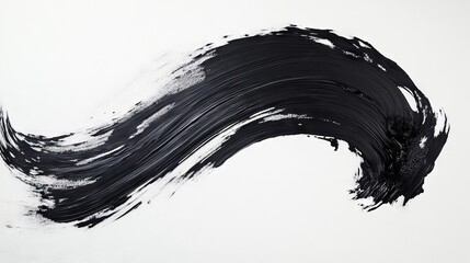 Dynamic black brushstroke creates an abstract art piece emphasizing movement and creativity