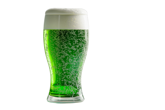A tall glass filled with green beer, topped with frothy foam, isolated on a transparent background