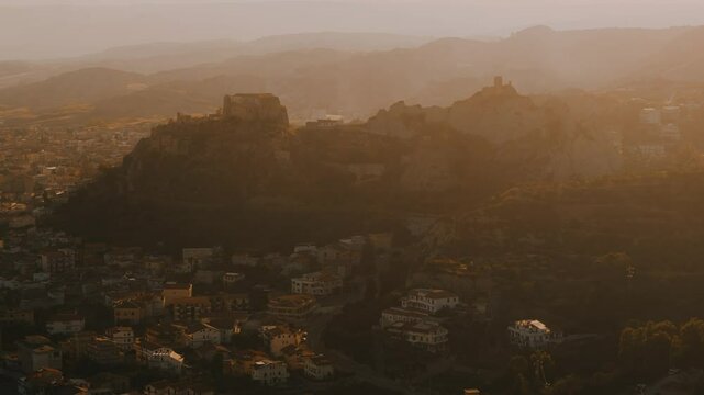 Aerial View of a Castle at  a Southern Coastal Town Roccella Ionica at Sunset