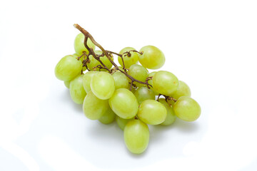 Fresh ripe grapes on white