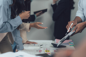 Collaborative Brainstorm: A diverse team of professionals engaged in a lively brainstorming session, discussing ideas and strategies, with a focus on collaboration and problem-solving.