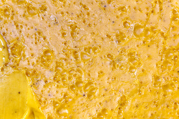 xture of honey with yellow iller.