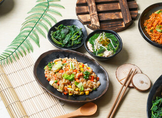 Shacha Fried Rice Special and herbs served in tray dish with chopsticks and spoon isolated background side view of taiwan food
