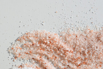 Himalayan salt on a white background, copy space for text