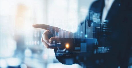 Businessman touching virtual screen with rising graph and data chart in blurred office environment focusing on growth strategy