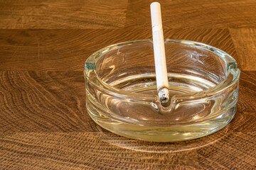 ashtray with cigarette in close-up