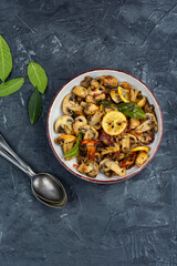 fried mushrooms with bay leaf, spices and lemon