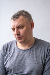Fototapeta premium distorted face of sad and grieved very upset person, dissatisfied with his hard fate