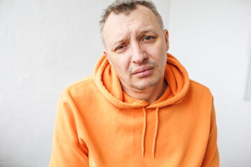 distorted face of sad and grieved very upset person, dissatisfied with his hard fate
