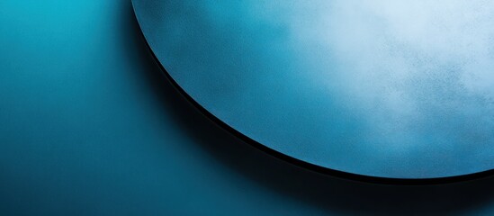 Teal circular disc on blue backdrop