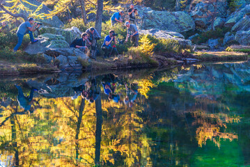autumnal mountain landscape with a small lake inside the Alpe Devero, Val D'Ossola, Verbania, Italia	