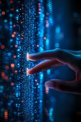 Fingers touching glowing digital data stream with blue and orange bokeh lights against dark background, representing future technology and connectivity.