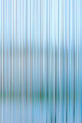 Obraz premium Abstract background with reeded ribbed glass effect texture