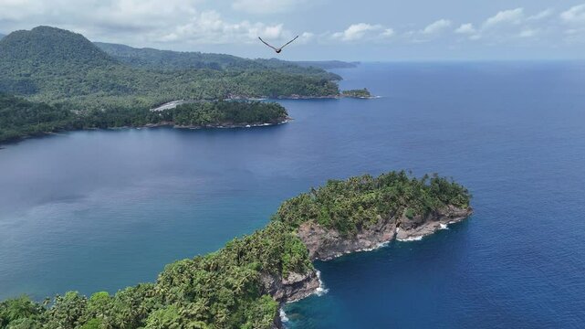 Sao Tome and Principe - Aerial View Near Micondo. Stunning Tropical Coastline With Lush Green Hills and Deep Blue Ocean.